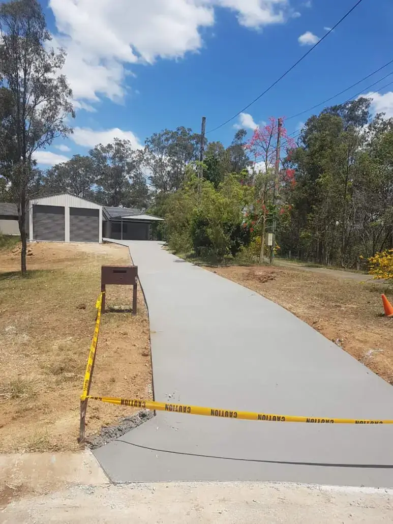 Acreage driveway — Plain concrete